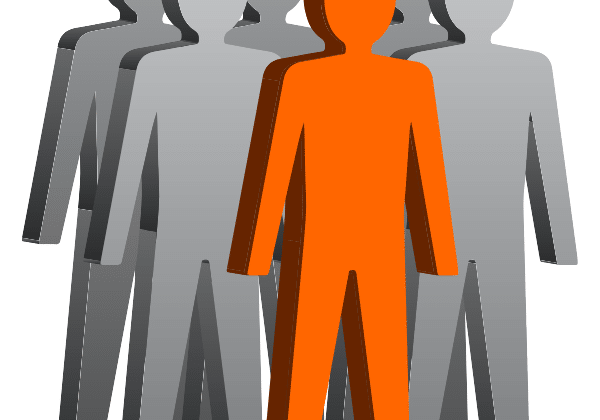 Image of several greyscale paper dolls with one orange doll in the front